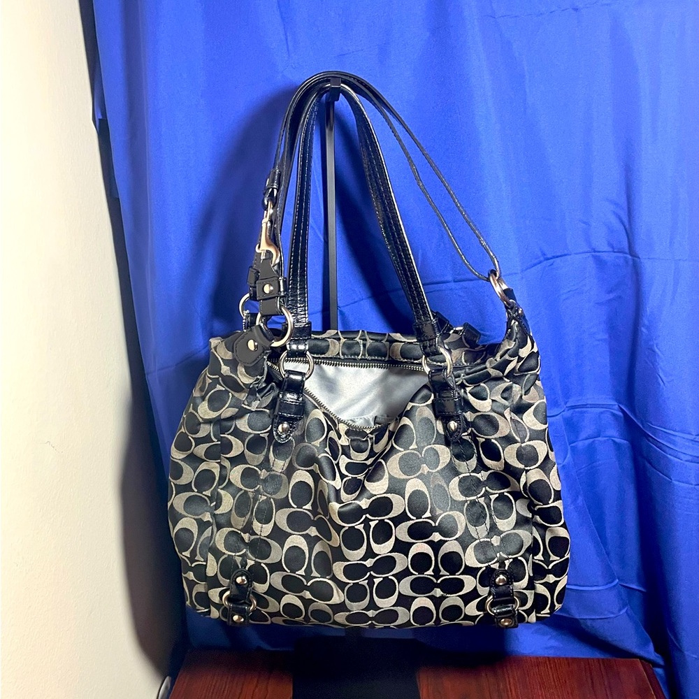 Coach monogram shoulder bag.  Has handles/strap for handbag and shoulder bag.